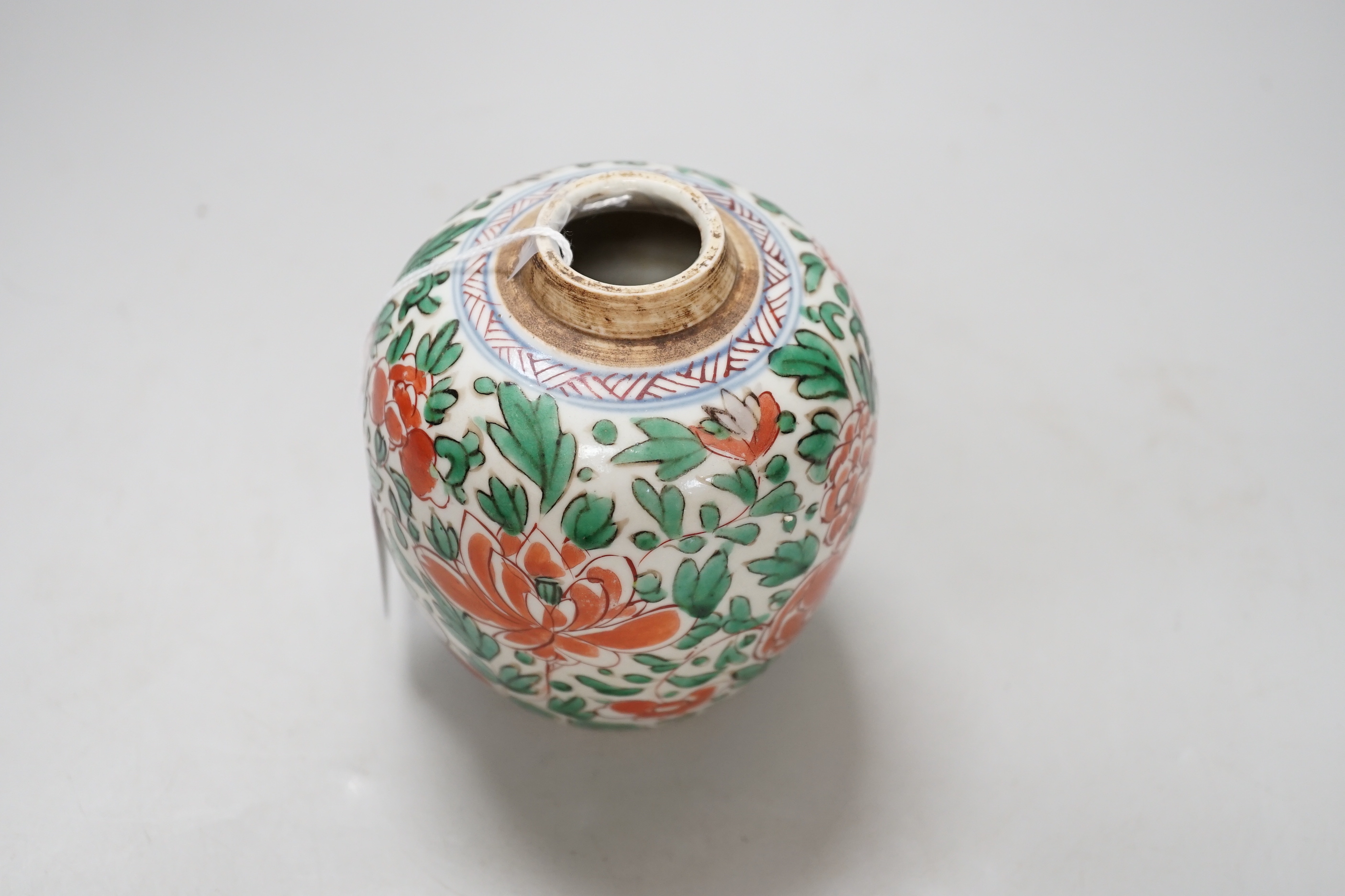 A late 17th century Chinese wucai small jar, 12cm high